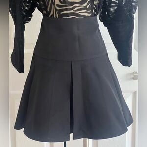 RED VALENTINO. Pleated Mini skirt. Size Euro 44. Color Black